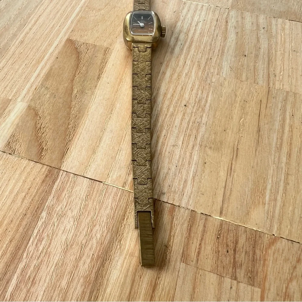 Vintage Jules Jurgensen ladies gold tone bronze tone mechanical dress watch